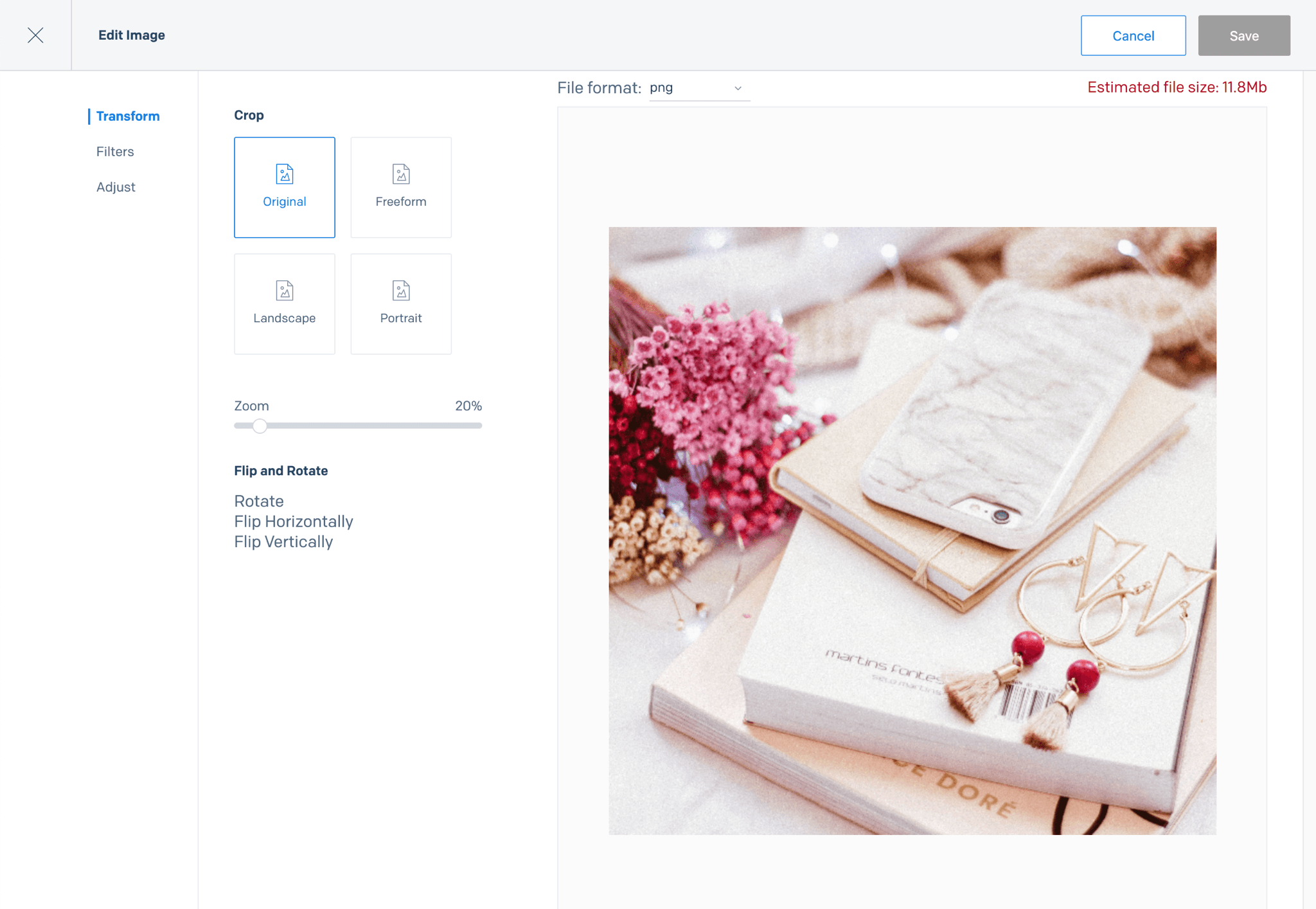 Editor with crop options and a preview of a phone on books with earrings.