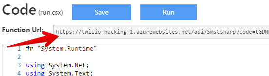 Highlighted function URL for Twilio API in code editor.
