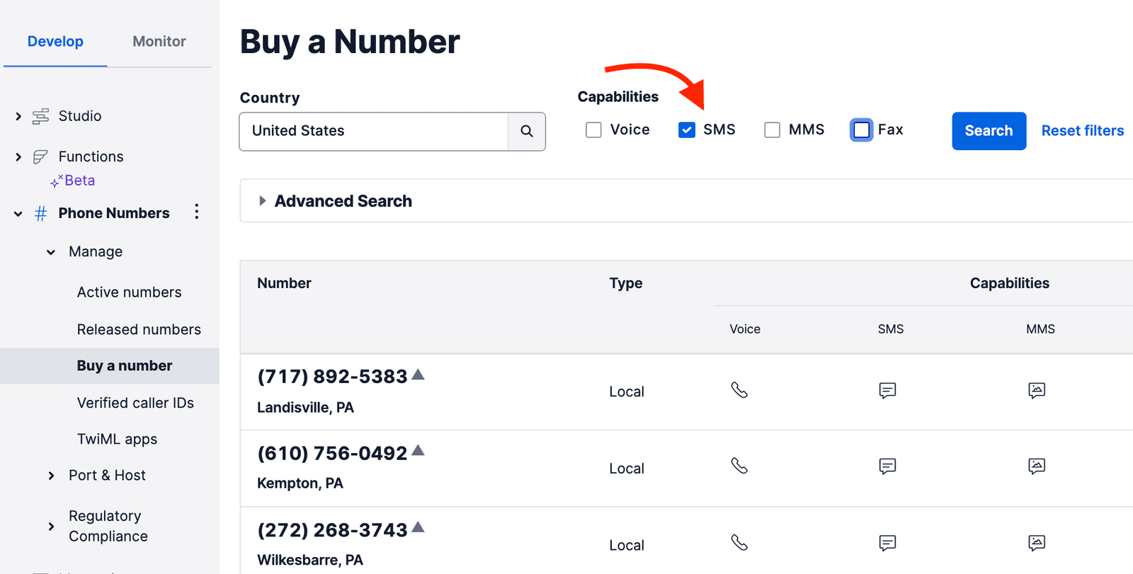 Interface for buying a phone number with SMS capability selected.